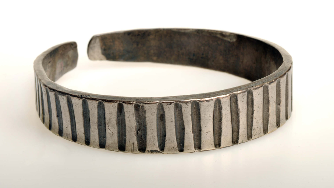 a close up image of a silver bracelet 