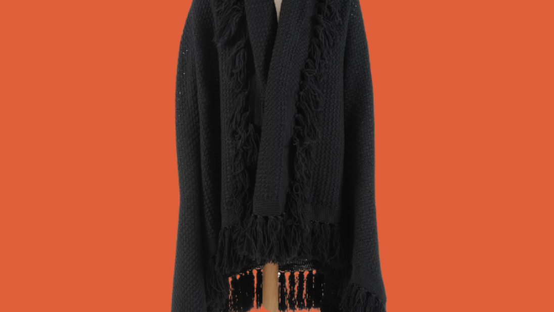 Black knitted shawl on a mannequin