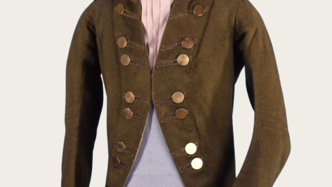 A men's green coat dating from the late 1700s to early 1800s.
