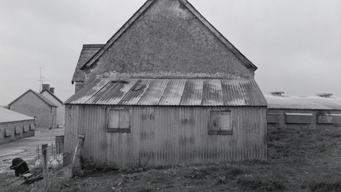 A black and white image of the side of an Orange Hall.