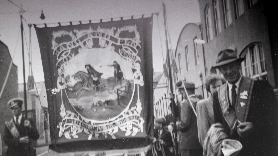 A black and white image of an Orange Order march.