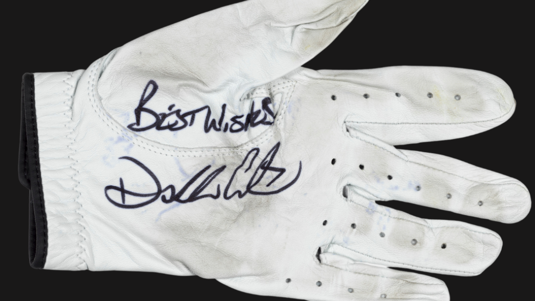 A golf glove signed by Darren Clarke.