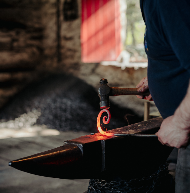 Hammering hot metal to make a poker