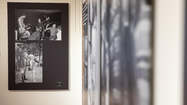 A picture of black and white photography panels - the panel in the main you can clearly make out the photos; the panel on the right is blurred for effect