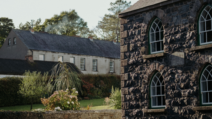 A scenic image of houses and cottages at ulster folk museum 