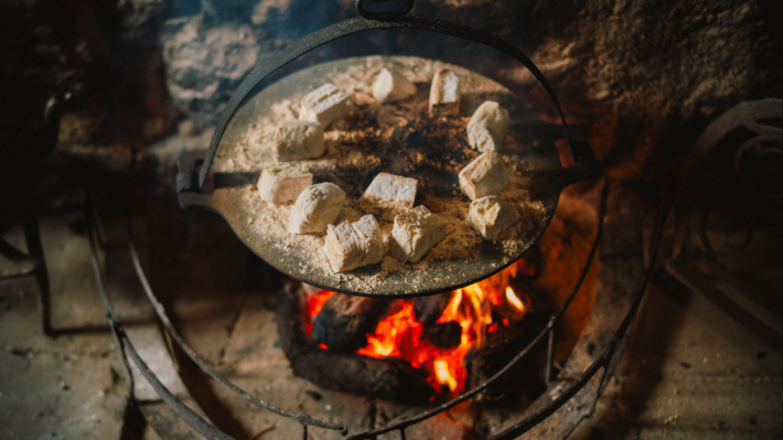 Soda bread cooking over the hot griddle