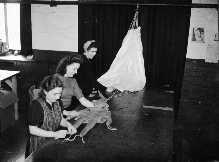 Women manufacturing dummies for parachutes