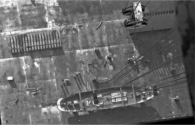 Photograph taken from the top of the Samson crane looking down on Result being lifted.