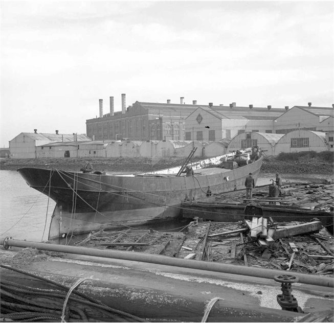 Result with her masts, spars and rigging removed, prior to ship being lifted into the Building Dock.