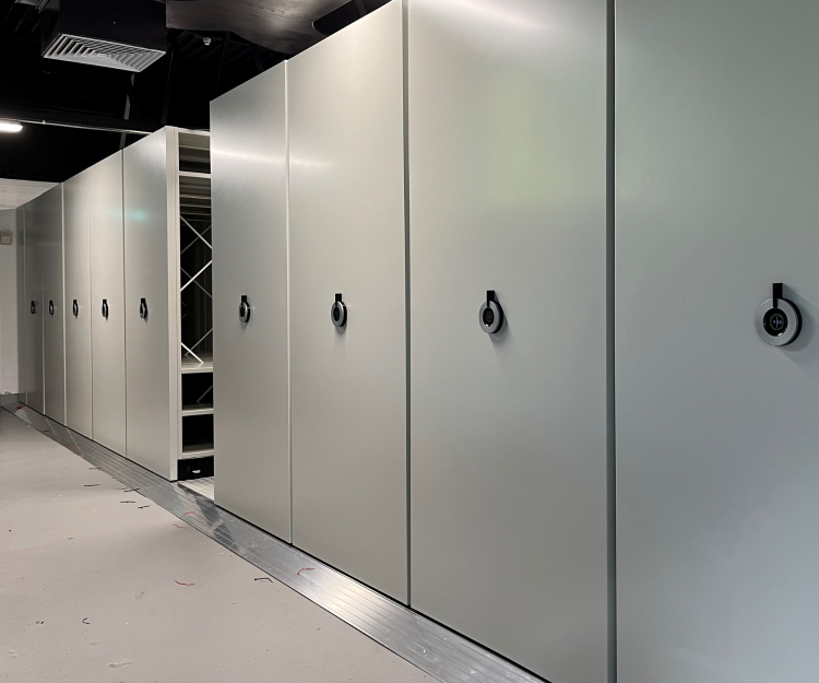 A row of grey storage racks.