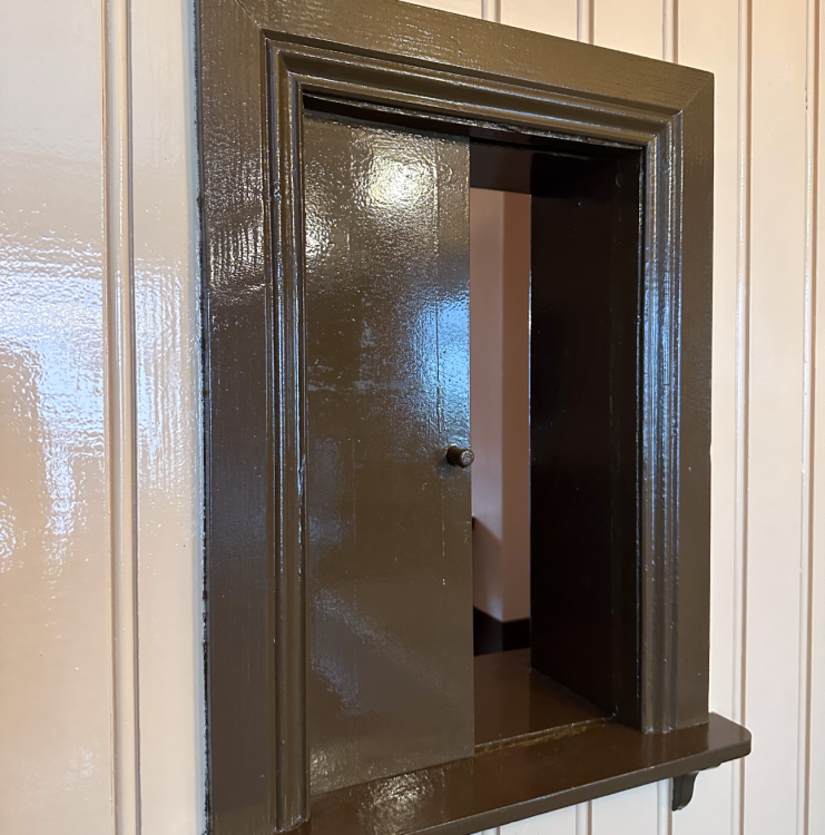 A serving hatch in a pub.