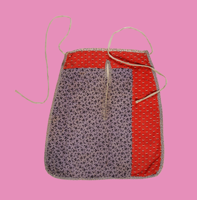Red and patterned fabric pocket with ties
