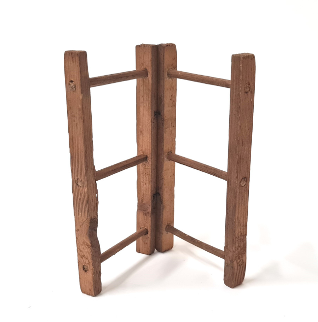 Dolls' house furniture: a wooden clothes horse.