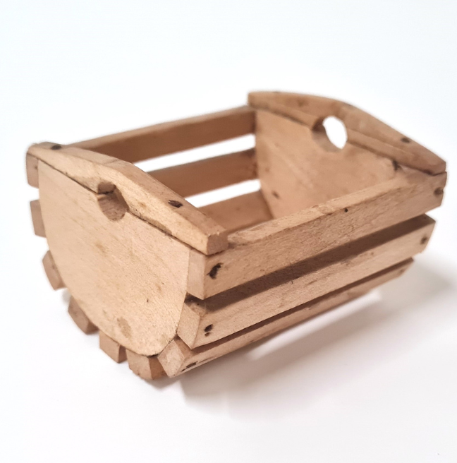 Dolls' house furniture: a potato basket.