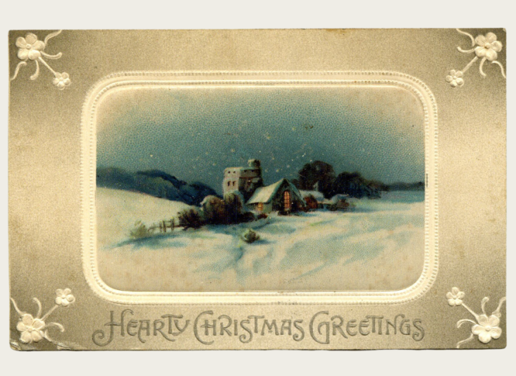 A Christmas postcard of a town decked in snow.