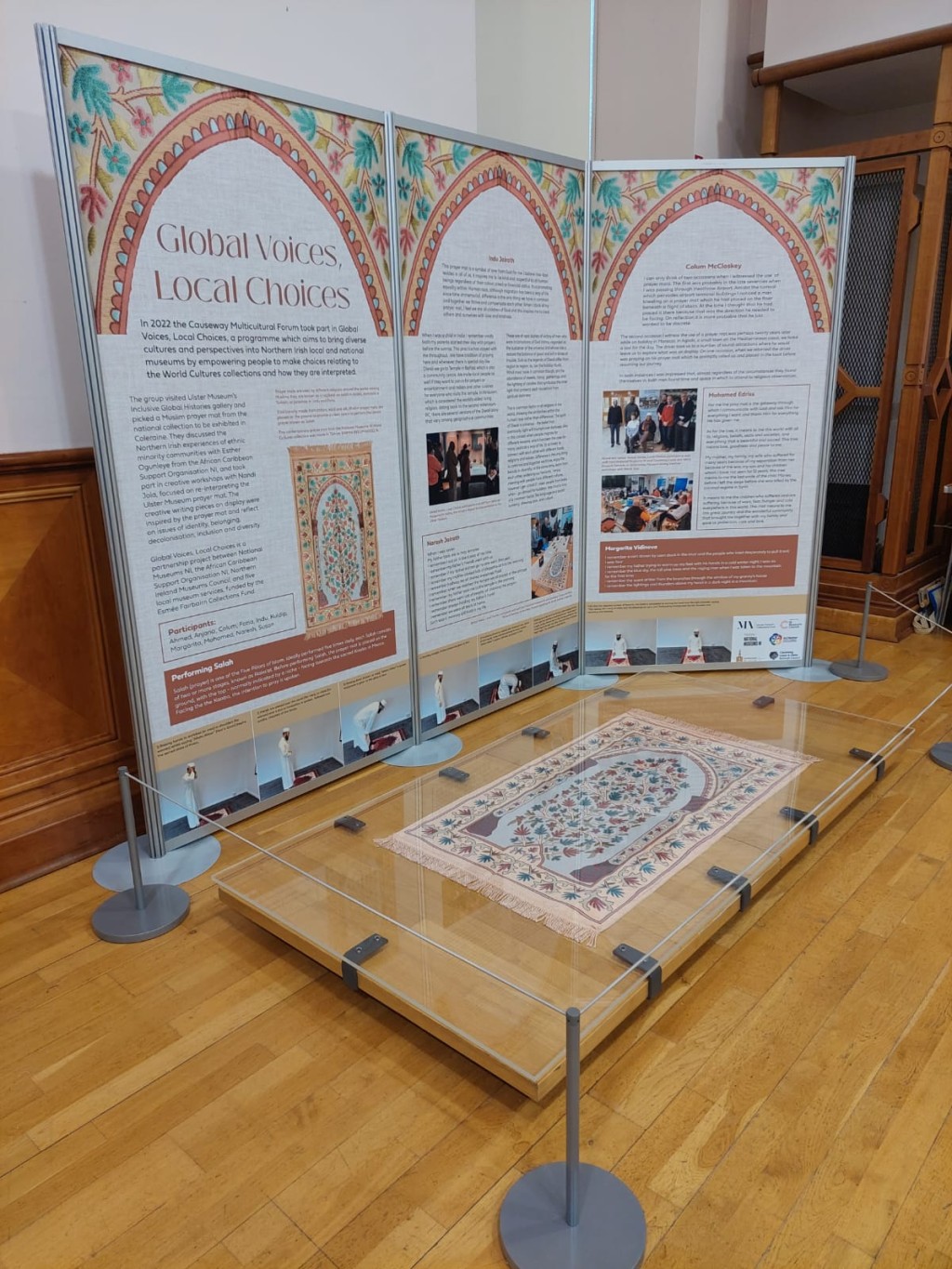 The prayer mat is displayed with its niche facing Mecca