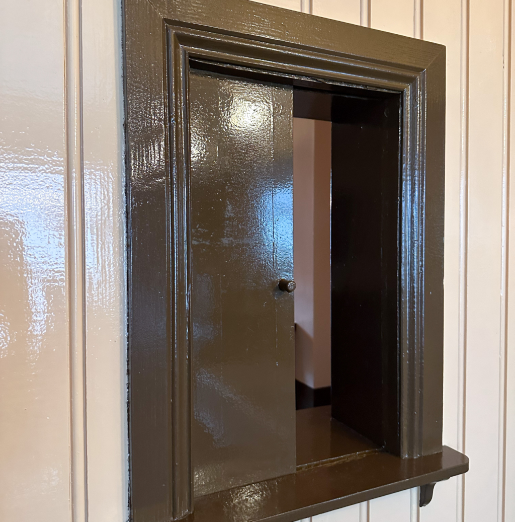 A serving hatch in a pub.