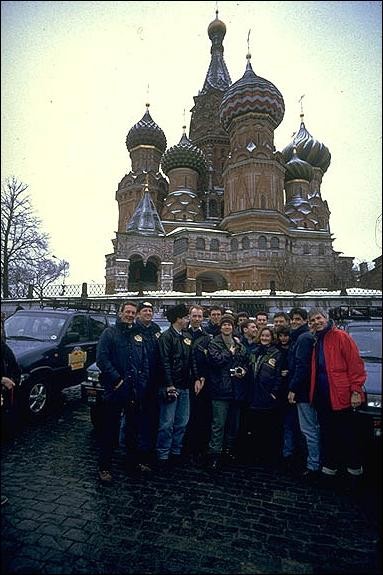 A group of people pose for a photograph in Moscow.