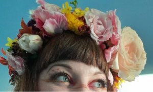 A lady wearing a flower crown 